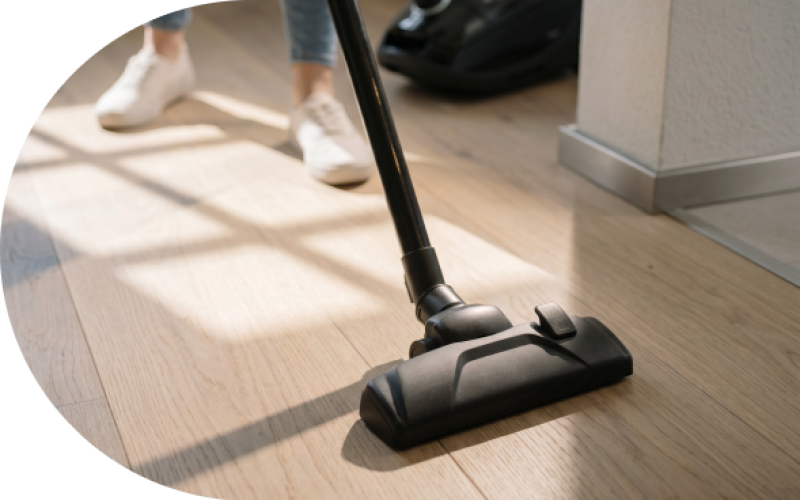 a person using a vacuum