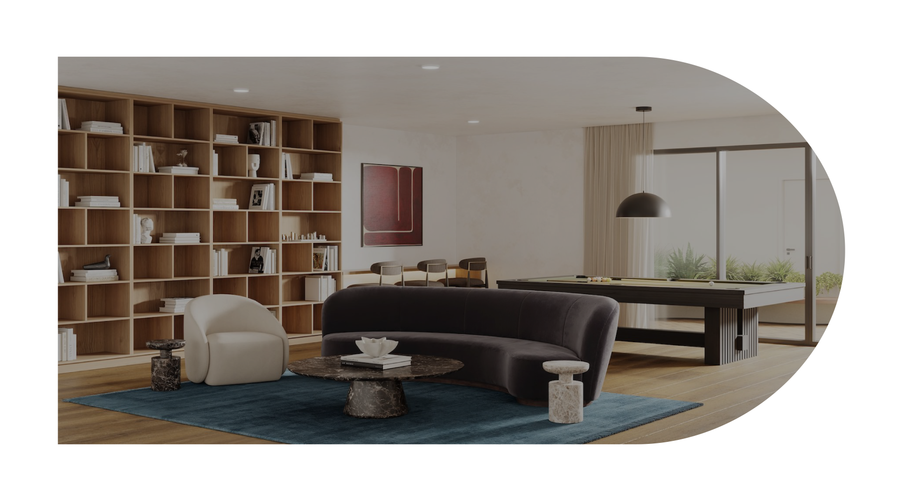 a clubroom with a couch, chair and a pool table